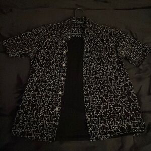 Men’s small black and white Ripndip x-ray pattern with, “Ned the Cat” printed on